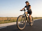 LANKELEISI RX600PRO full suspension eMTB with rider on hillside trail